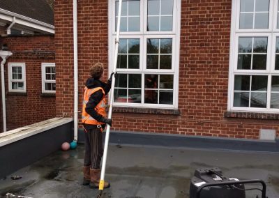 Vac cleaning second level gutters